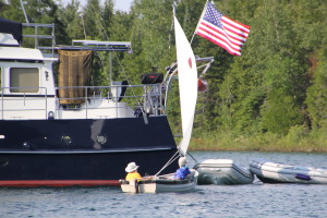 Panda Bear dingy under sail - Jubilee in the background